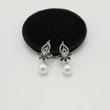 Silver Pearl Drop Earrings with CZ Floral Top – Rs. 1,150