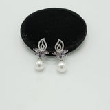 Silver Pearl Drop Earrings with CZ Floral Top – Rs. 1,150