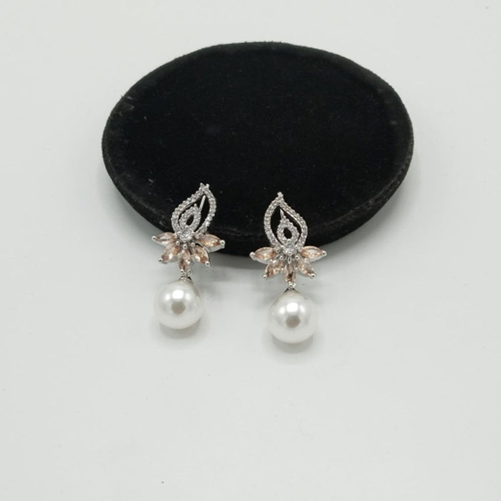 Silver Pearl Drop Earrings with CZ Floral Top – Rs. 1,150
