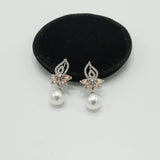 Silver Pearl Drop Earrings with CZ Floral Top – Rs. 1,150