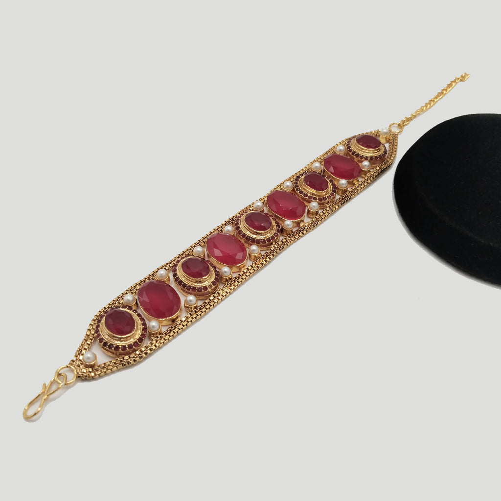 Gold Bracelet with Crystal & Pearl Detailing – Rs. 2,350