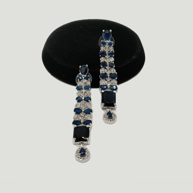 Silver Earrings with Sapphire Blue Stones & CZ Accents – Rs. 2,450