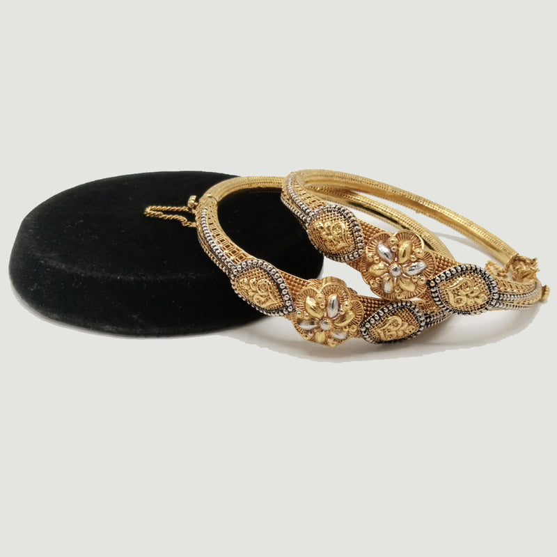 Traditional Ethnic Gold-Toned Bangles with Floral Motif – Rs. 7,800